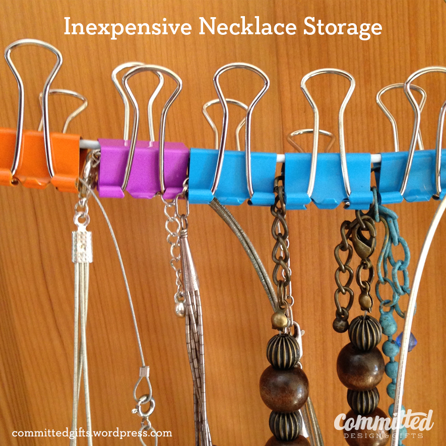 Binder clips for storing necklaces.